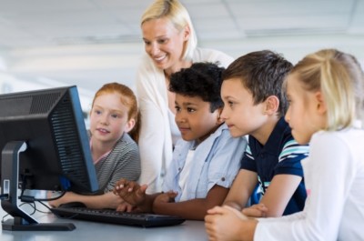 Category – Teaching Assistant – kids-computer-class-with-teacher_256588-644 (1)